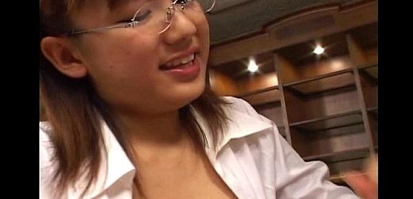  Japanese teen Eri Yukawa gives hand job over her tits